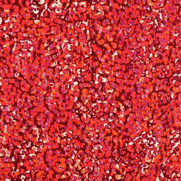 Viscoza creponata culoare roz cu model floral abstract latime 136/138 cm 75%VI 25% poliamida