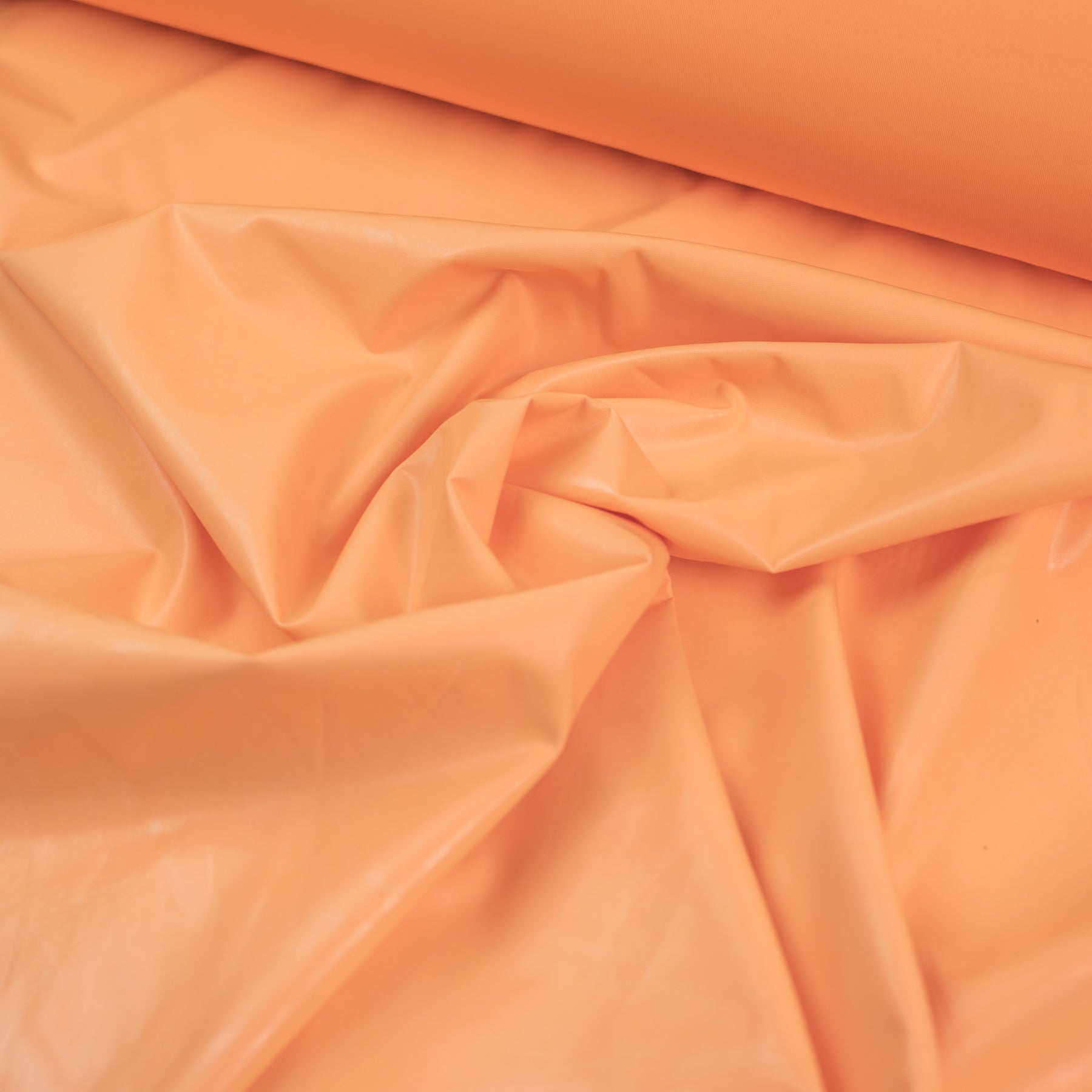 Latex culoare piersica latime 125 cm 100% polyester