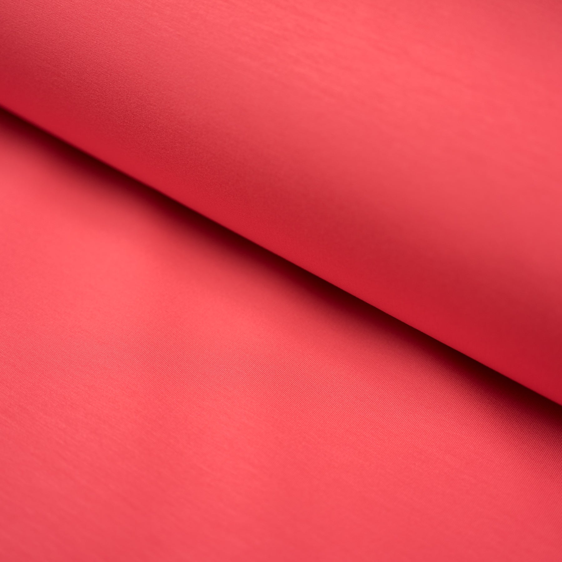 Tesatura sintetica fixa rosu coral 140 cm latime