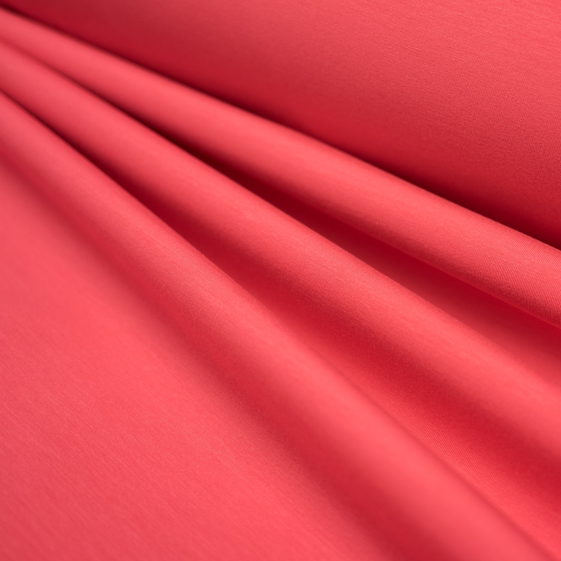 Tesatura sintetica fixa rosu coral 140 cm latime